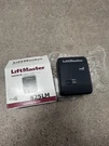Liftmaster 825LM Remote Light Control - New In Open Box. Fixed Price $34.95.