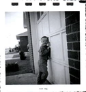 1956 Vintage Black & White Photo Boy By Garage Door Mid-century Usa. Fixed Price $14.00.