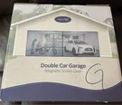 Double Car Garage Magnetic Screen Door. Fixed Price $20.00.