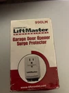Liftmaster 990LM Garage Door Opener Suge Protector - New In Box. Fixed Price $35.00.